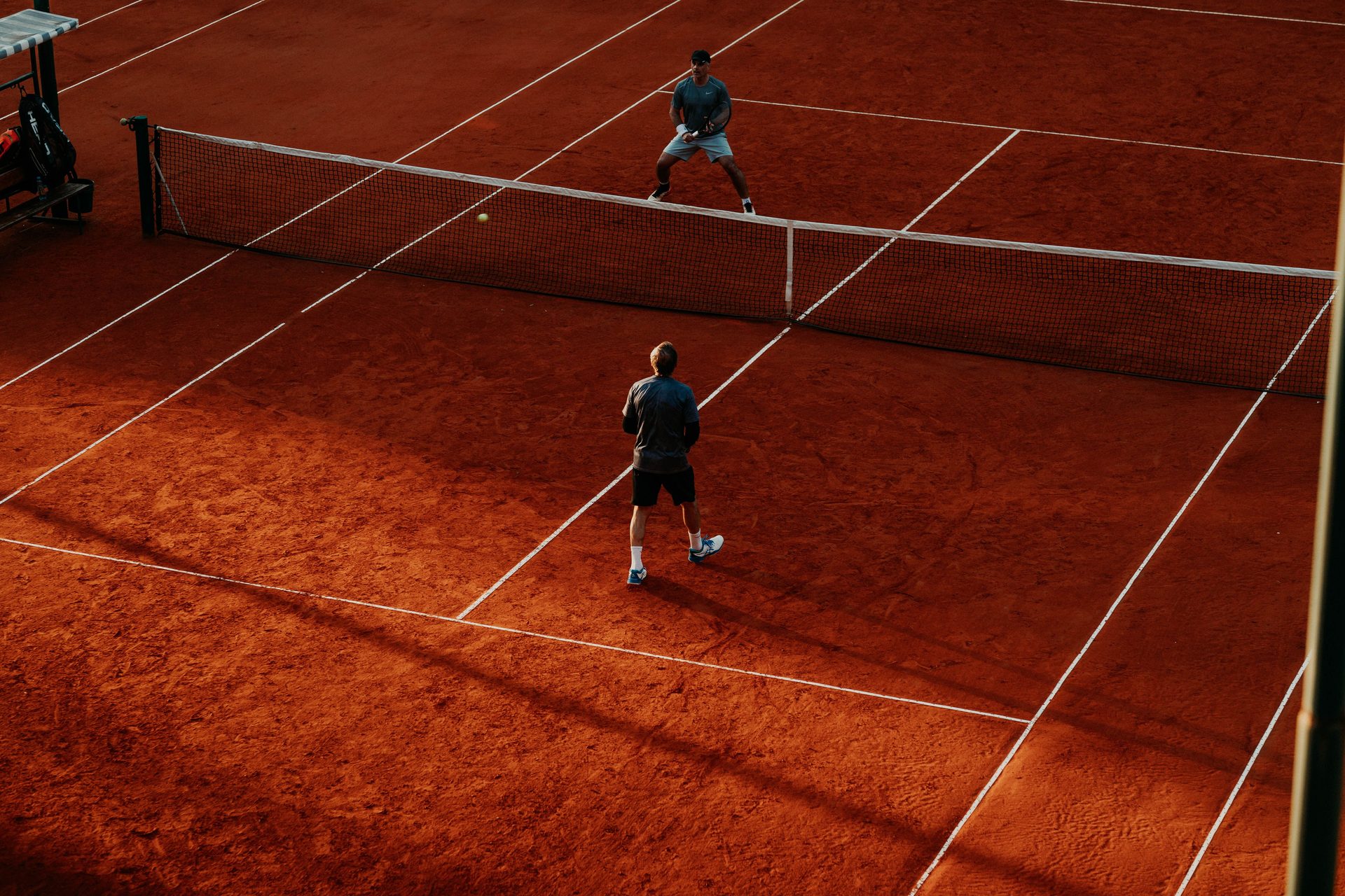 Players rallying at the net during a match